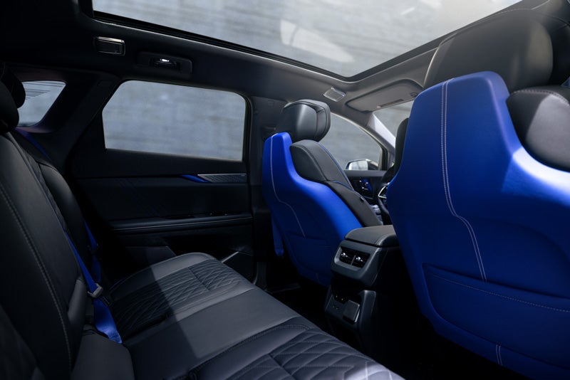 Back Seat View of the 2026 OPTIQ-V Blue Front Seats, Sun Roof, and Interior | Cadillac of Jackson in Ridgeland MS